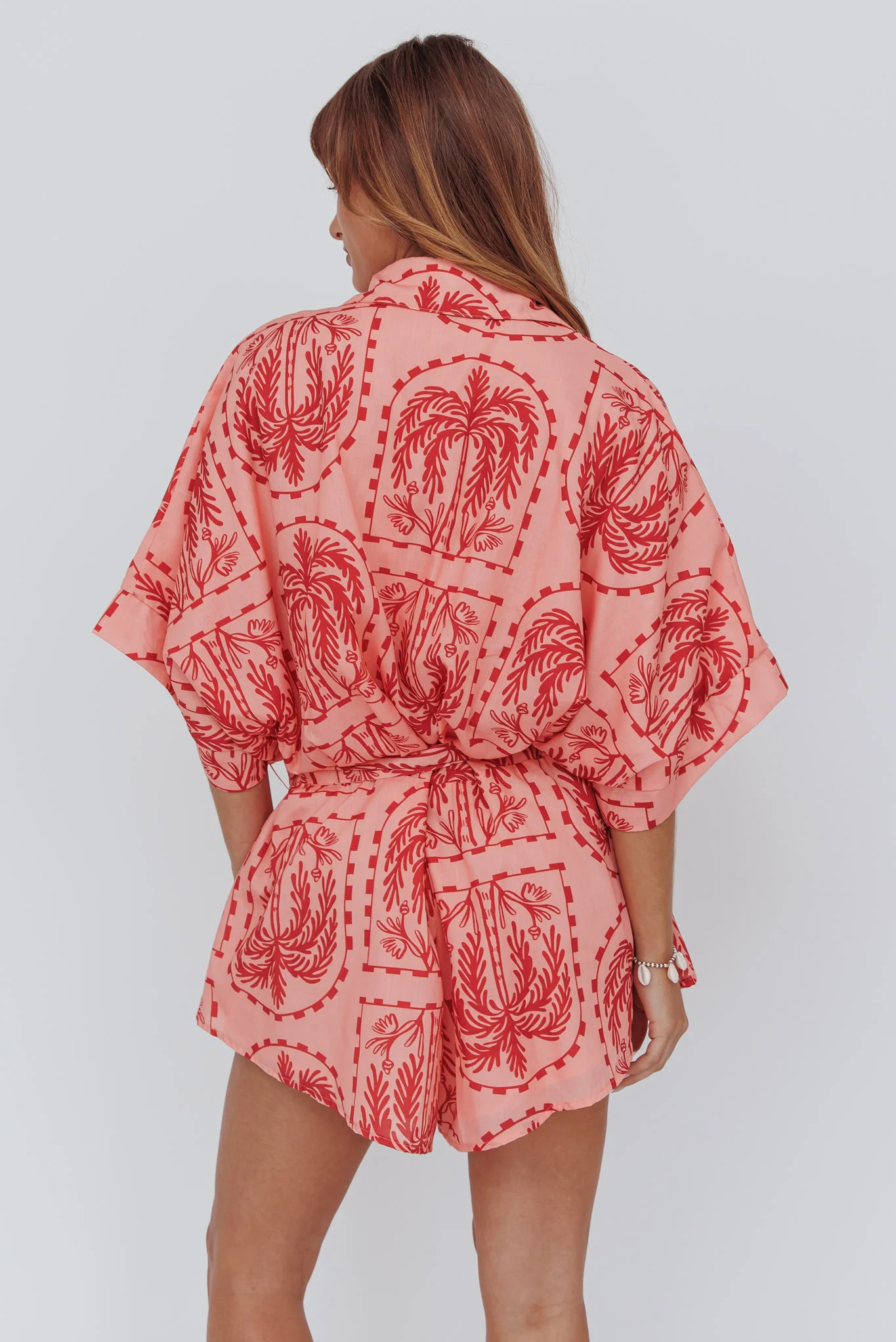 Daytona Beach Button-Up Romper Print Peach - Ruaus